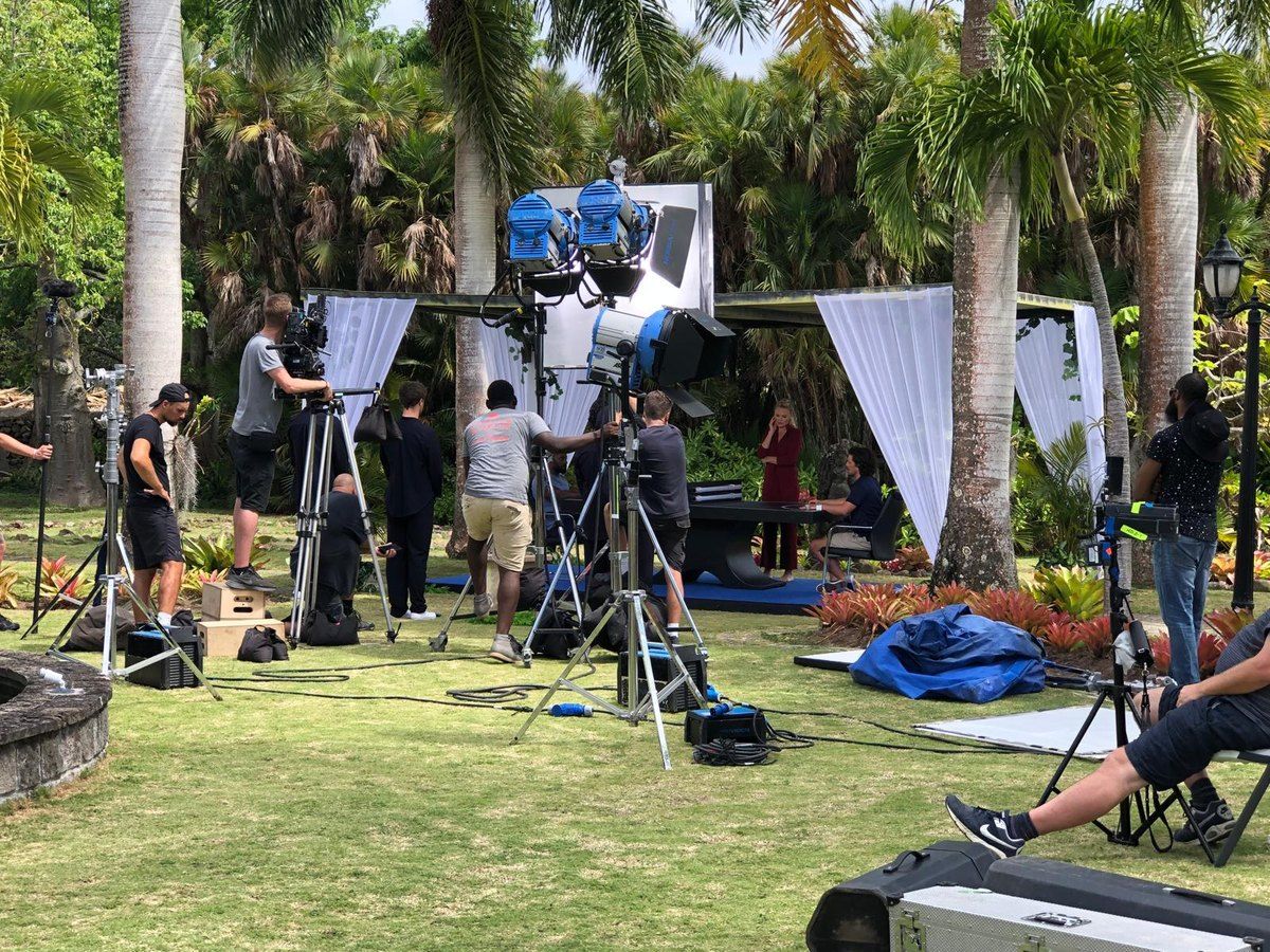 Lights, a jib and crew setting up on location